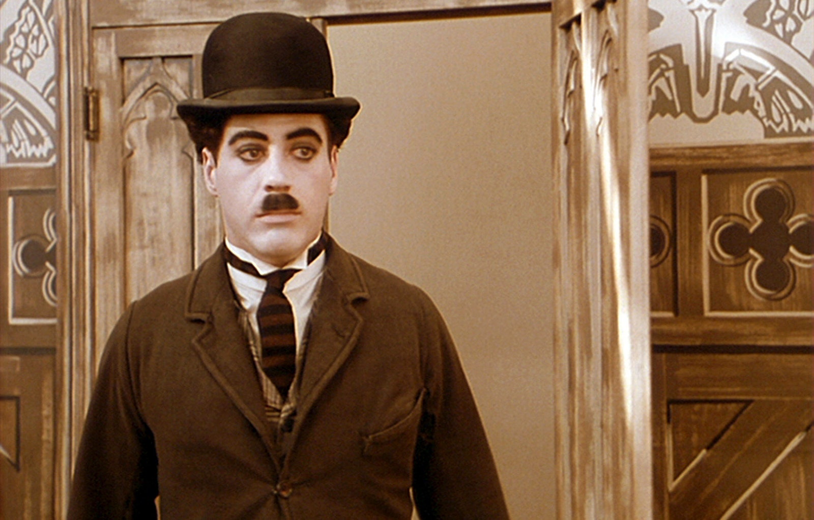 Robert Downey Jr. as Charlie Chaplin